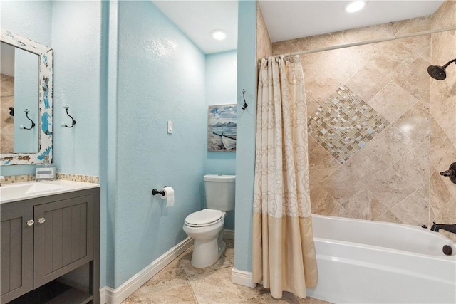 full bathroom with shower / bath combo, vanity, baseboards, and toilet