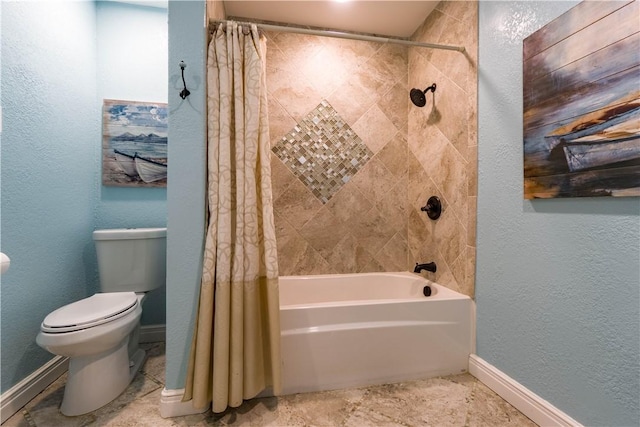 full bathroom with a textured wall, shower / bath combination with curtain, toilet, and baseboards