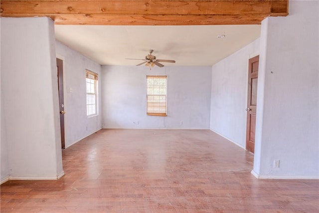 unfurnished room with ceiling fan and light wood-type flooring