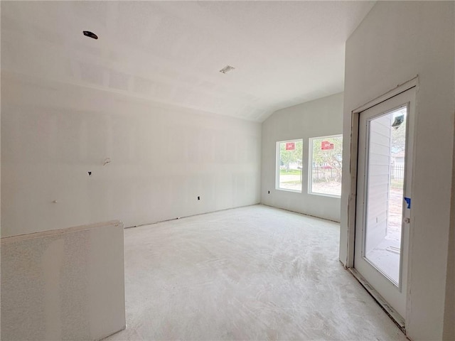 101 Broad Oak Dr, Rockport, TX 78382 - empty room featuring lofted ceiling and carpet floors