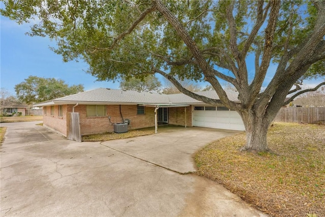 ranch-style home featuring a garage