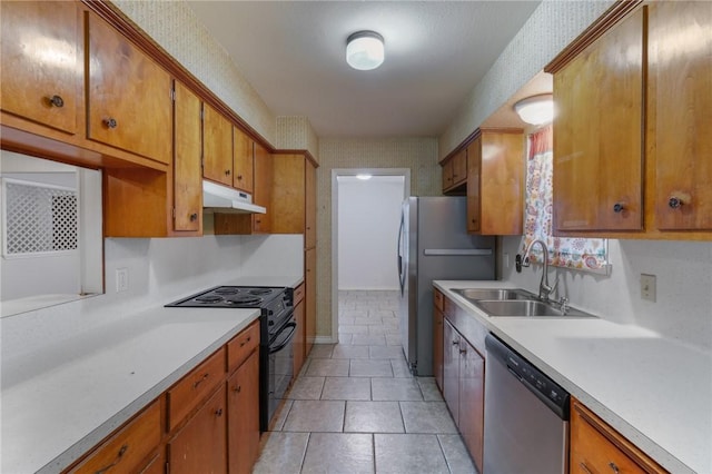 kitchen featuring appliances with stainless steel finishes, sink, and light tile patterned floors