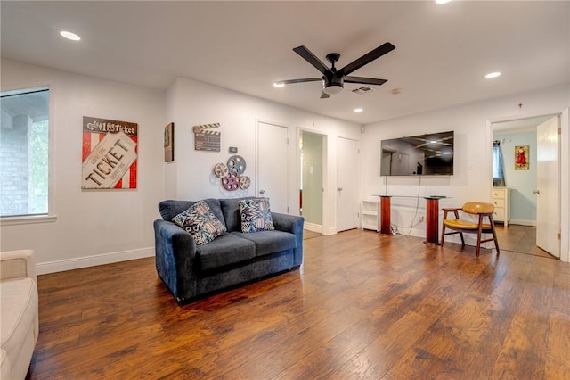 living room with baseboards, recessed lighting, wood finished floors, and a ceiling fan