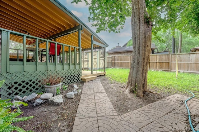 view of yard featuring fence