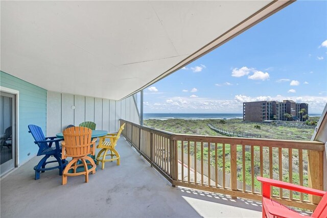 5973 State Highway 361 Unit 230, Port Aransas, TX 78373 - balcony with a water view and outdoor dining space