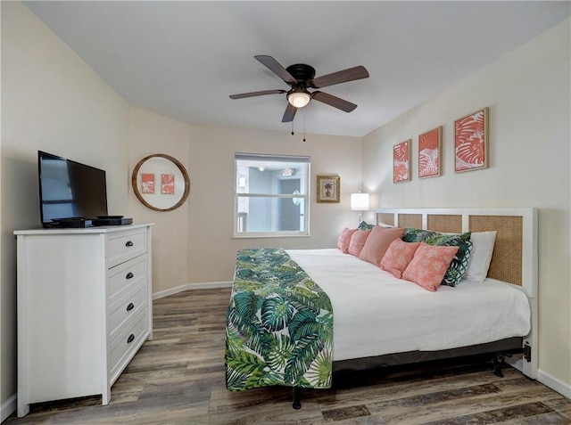 5973 State Highway 361 Unit 230, Port Aransas, TX 78373 - bedroom with wood finished floors, baseboards, and ceiling fan