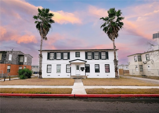 view of front of house with a lawn