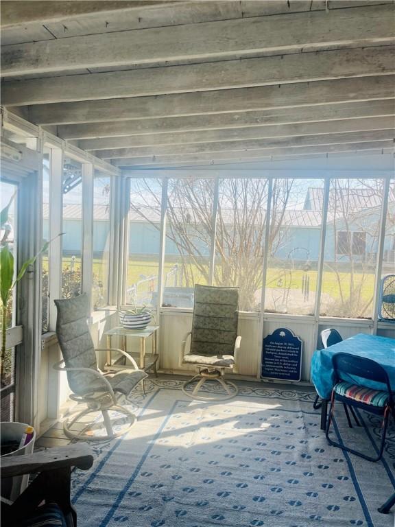 sunroom / solarium with a healthy amount of sunlight