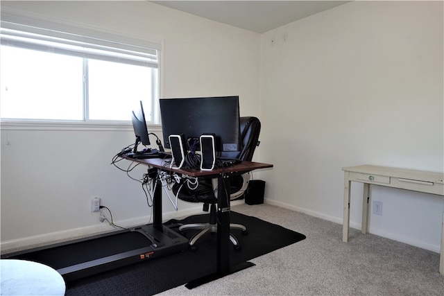 exercise room with carpet floors