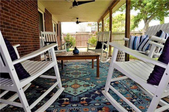 exterior space featuring ceiling fan