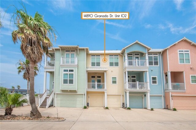 14890 Granada Dr Unit 102, Corpus Christi, TX 78418 - view of property with an attached garage and driveway