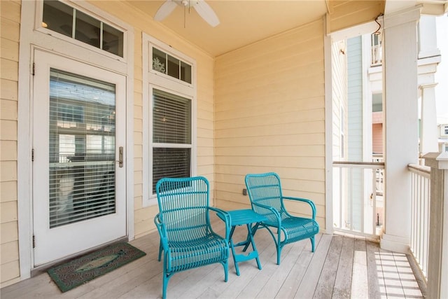 exterior space with a ceiling fan and a porch