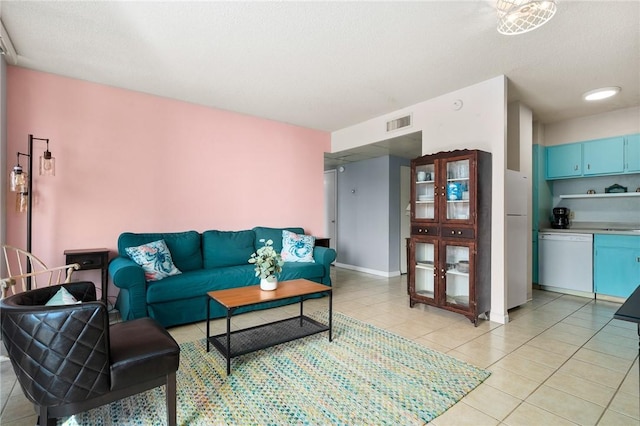 715 S Upper Broadway St Unit 404, Corpus Christi, TX 78401 - living area with light tile patterned floors