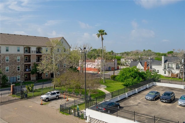 715 S Upper Broadway St Unit 404, Corpus Christi, TX 78401 - view of community with uncovered parking and a residential view