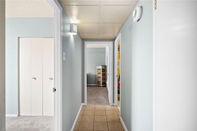 715 S Upper Broadway St Unit 404, Corpus Christi, TX 78401 - hall featuring light carpet and light tile patterned floors