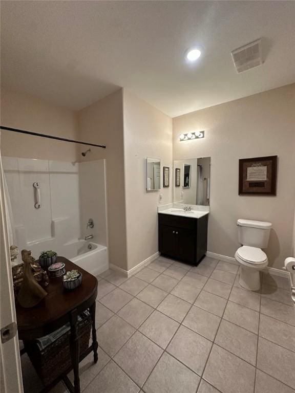 803 Molina St, Robstown, TX 78380 - bathroom with tile patterned floors, toilet, baseboards, and vanity