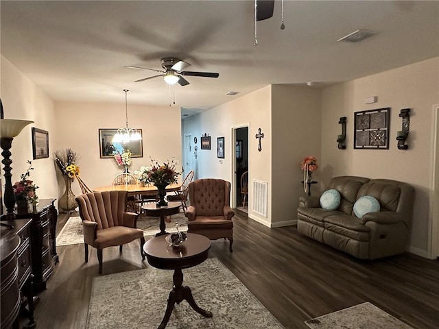 803 Molina St, Robstown, TX 78380 - living area with wood finished floors, baseboards, ceiling fan, and a chandelier