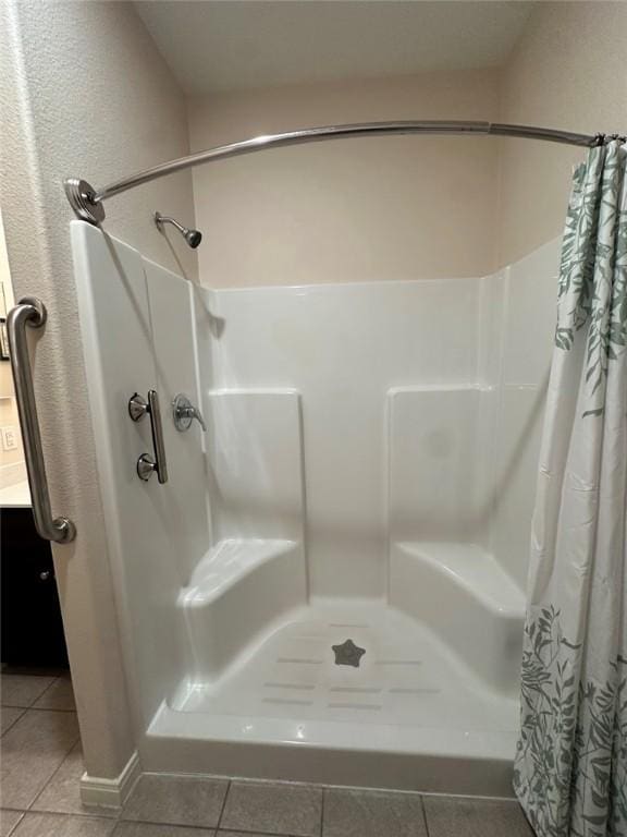803 Molina St, Robstown, TX 78380 - full bath with tile patterned floors and a shower stall