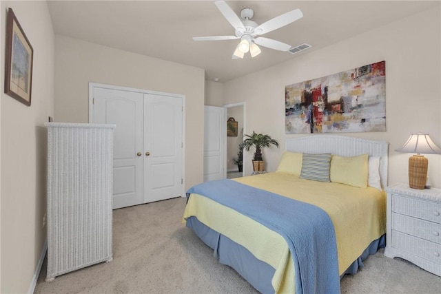 14901 Windward Dr Unit 704, Corpus Christi, TX 78418 - bedroom with visible vents, ceiling fan, carpet flooring, and a closet