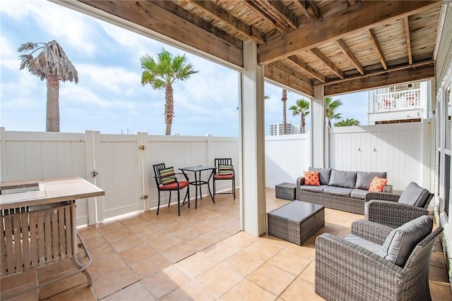 14901 Windward Dr Unit 704, Corpus Christi, TX 78418 - view of patio / terrace with an outdoor living space and a fenced backyard