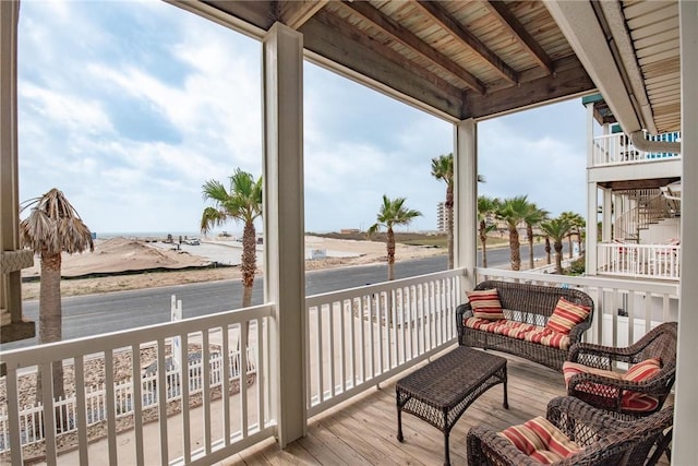 14901 Windward Dr Unit 704, Corpus Christi, TX 78418 - wooden deck featuring a water view