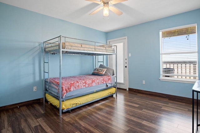 bedroom featuring dark hardwood / wood-style floors and ceiling fan