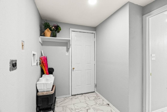 647 W Main Ave, Robstown, TX 78380 - laundry area featuring hookup for an electric dryer, washer hookup, and light marble finish floors