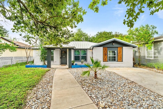 647 W Main Ave, Robstown, TX 78380 - single story home with brick siding and a metal roof