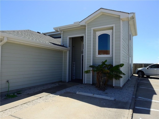 view of front of house with a shingled roof