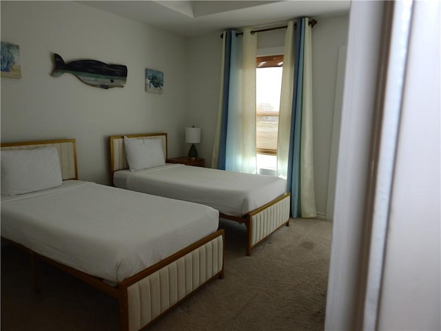 bedroom featuring light colored carpet