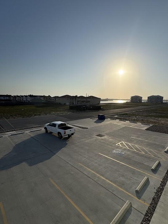 view of parking / parking lot