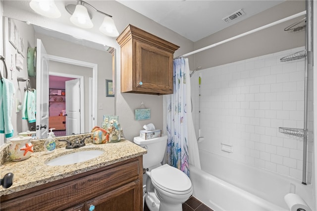 full bathroom with shower / bath combo with shower curtain, vanity, and toilet