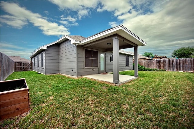 10113 Maverick, Corpus Christi, TX 78410 - back of property featuring a yard, a patio, and a fenced backyard