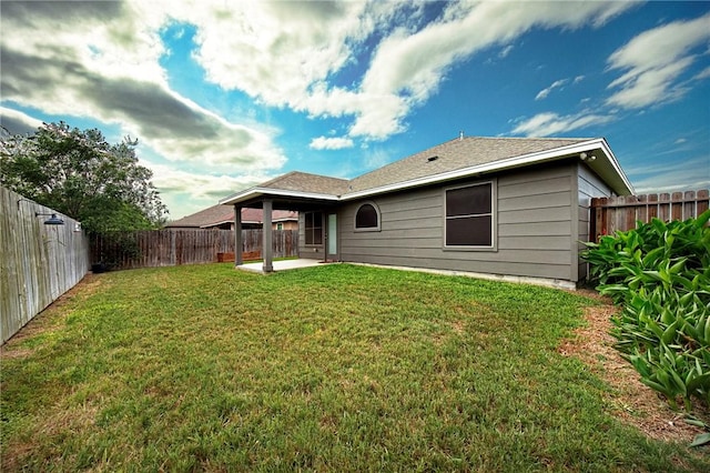 10113 Maverick, Corpus Christi, TX 78410 - back of house featuring a yard, a patio area, and a fenced backyard
