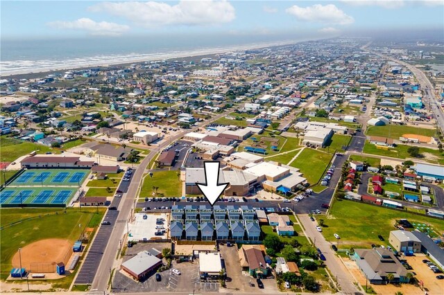 bird's eye view with a beach view and a water view