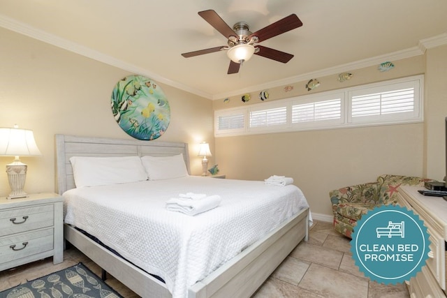 bedroom with ceiling fan and crown molding