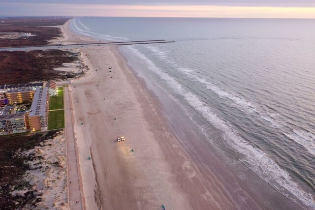 property view of water featuring a beach view