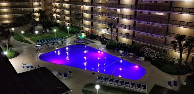 view of swimming pool featuring a patio area