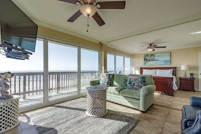 sunroom featuring ceiling fan