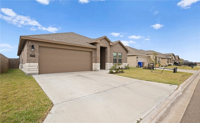 ranch-style house with a garage and a front yard