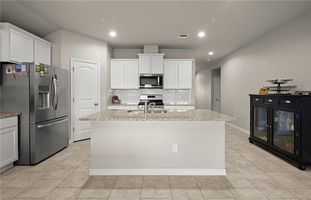 kitchen featuring sink, a center island with sink, white cabinetry, and appliances with stainless steel finishes