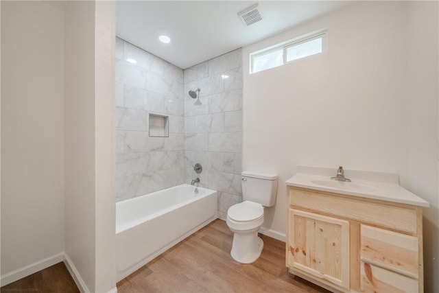 5506 Curtis Clark Dr, Corpus Christi, TX 78411 - full bath with vanity, wood finished floors, and bathing tub / shower combination