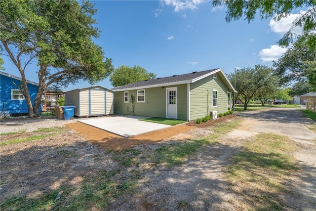 5506 Curtis Clark Dr, Corpus Christi, TX 78411 - back of property featuring a shed and a patio area