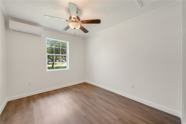 unfurnished room with a wall unit AC, hardwood / wood-style floors, ceiling fan, and crown molding