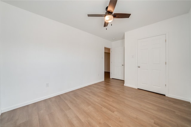 unfurnished bedroom with light hardwood / wood-style floors and ceiling fan