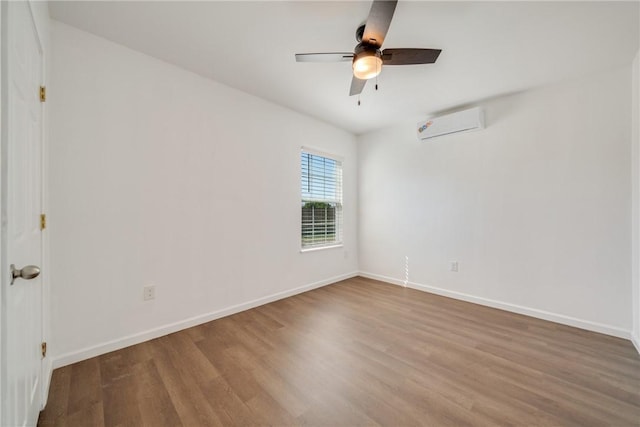 5506 Curtis Clark Dr, Corpus Christi, TX 78411 - spare room with wood finished floors, an AC wall unit, and a ceiling fan