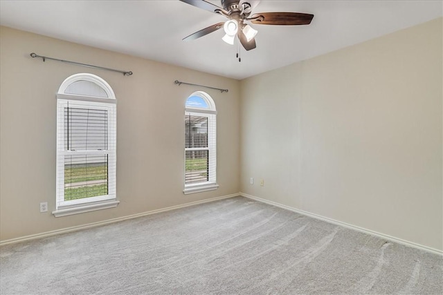 13656 Teague, Corpus Christi, TX 78410 - spare room featuring a ceiling fan, carpet flooring, and baseboards