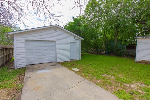 garage with a yard