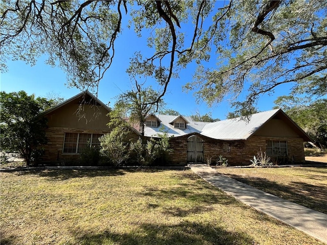 exterior space featuring a front lawn