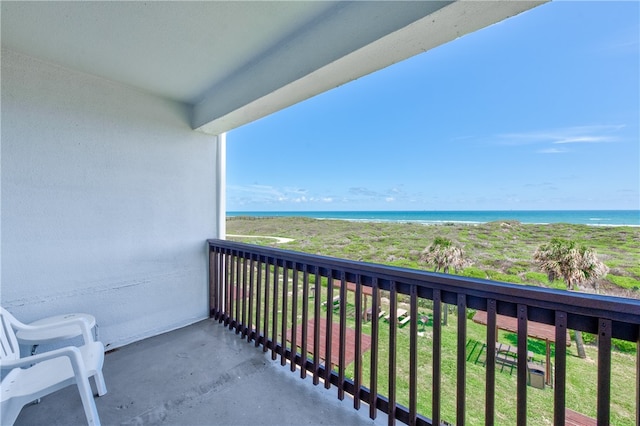 balcony featuring a water view